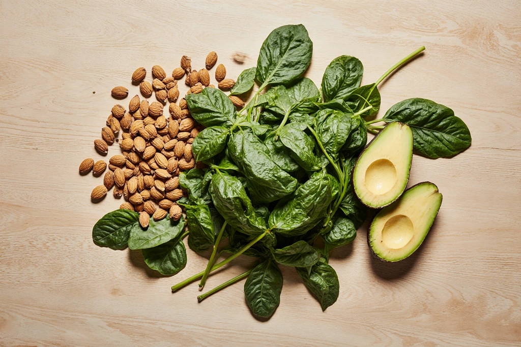 Image of magnesium-rich foods like spinach, almonds, and avocados